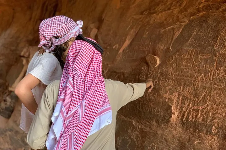 A private 4x4 on red sand below the cliffs on a half-day Wadi Rum desert tour